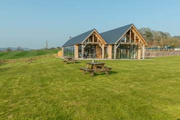 The Otter Valley Field Kitchen is on the very next farm. Fabulous award-winning ice cream and other delights. You will pass it on your way here.