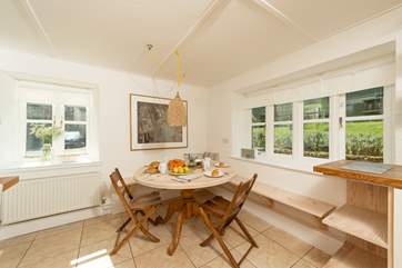 The kitchen/breakfast-room is full of light.