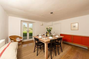 There is a separate dining-room with French windows out to the patio and enclosed garden - both of which look out over fields and the view beyond.