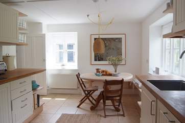 The kitchen/breakfast room is filled with natural light. This is the first room to the right from the entrance hall. It links to the living room too.