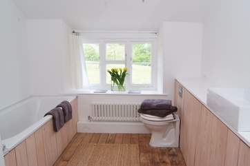 This is the family bathroom, it has a shower cubicle too. There is a second shower and wc on the ground floor in the utility room.