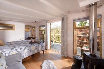 The gorgeous living-room is open plan with everything you could need for a comfortable stay.