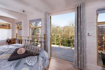 Throw open the doors to the raised deck and let the outside in.