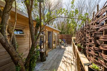 There are two ways to enter the cabin - through the double doors via the raised deck or through the side door, that enters straight into the shower-room.