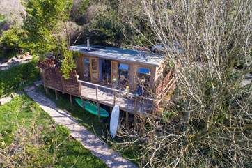 There is plenty of room to store surfboards and kayaks etc under the cabin, if you wish to bring them with you.