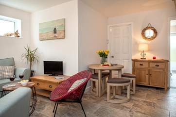 The open plan sitting/dining-room.
