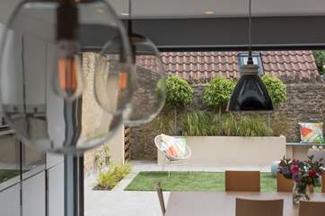 There is a seamless flow from inside to out. The courtyard garden is a sheltered sun-trap.
