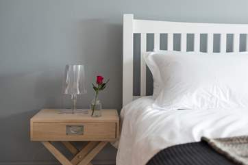 Crisp linens and cool colours are a theme throughout the house.