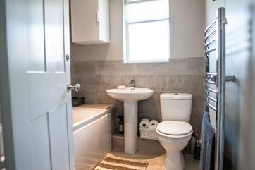The family bathroom with bath and shower over.