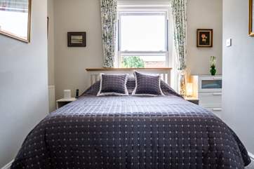 A sumptious king-sized bed for ultimate comfort.