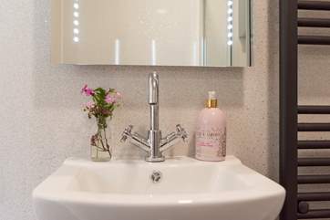 Complete with motion-sensor backlit mirror.