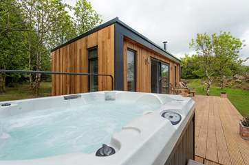 Complete with bubbling hot tub to enjoy the rural bliss from.