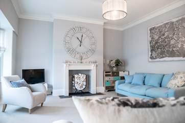 The separate front sitting-room has some lovely features, include this fabulous wall clock.