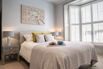 Each bedroom is tastefully decorated with sumptuous bedding and pastel shades.