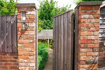 Parking for one car is to the side of the property in front of the garden gate which is lockable.