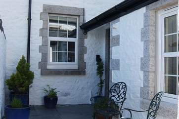 The little courtyard outside the kitchen/dining-room catches the afternoon sun.