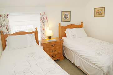 The twin bedroom (Bedroom 2) is at the back of the cottage and looks down into the little courtyard.