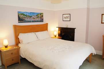 Bedroom 1, the double bedroom with locally-made oak furniture.