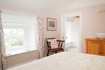 The double bedroom window has views out to sea.