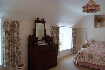 Bedroom 1 includes some beautiful pieces of period furniture.