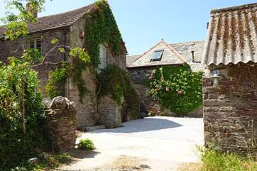 Another angle of this pretty barn with the stone steps leading up to the front door.