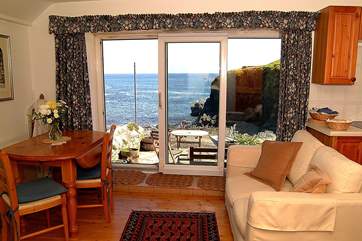 The spectacular view from inside the cottage. (new sofa, photos to follow)
