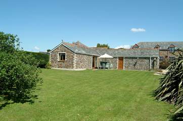 Outside the property there is a private patio and a level lawned garden.