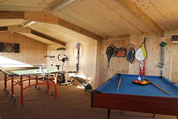 There is pool, table-tennis, air hockey to play, a treadmill, rowing machine and eliptical trainer to help you keep fit, and various other items of equipment to suit all needs.