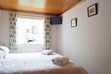 Both bedrooms have TVs.