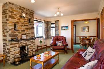 Double doors lead from the dining area into the lounge