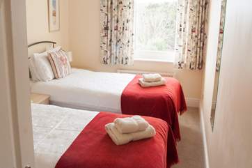 The twin beds in Bedroom 2 are full size singles so suitable for adults or children.
