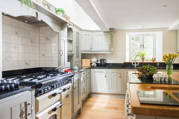 Cleverly sited Velux windows bring additional natural light into this gorgeous kitchen.