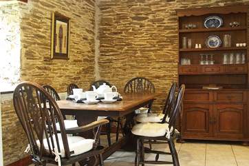 The dining-area has views across the countryside towards the village church in the distance.