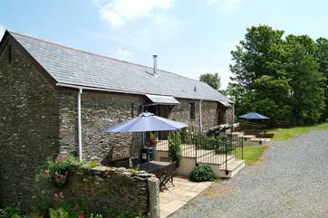 The cottages each have a sunny front patio.