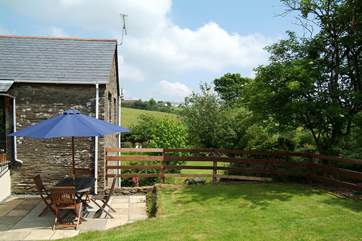 The sunny patio outside Benson's Cottage.