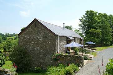 The view from the driveway approaching the cottages, which are set in beautiful, well maintained and peaceful grounds.
