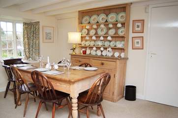 The old pine dresser blends perfectly with the dining furniture.
